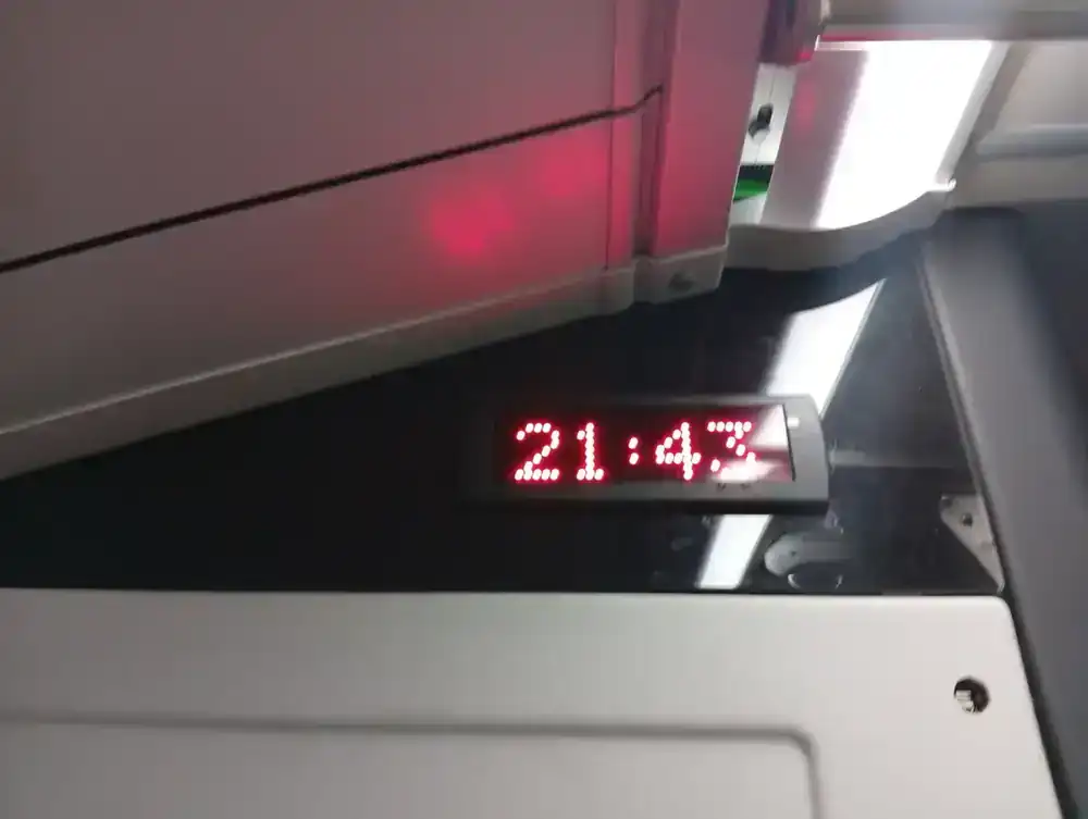 The on-board clock, still running at 21:43
