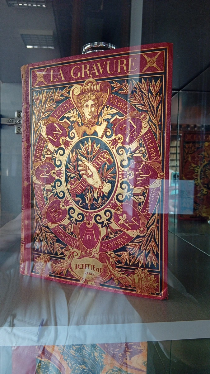 La Gravure, Hachette of Paris — red leather tooled in gold, in a display case