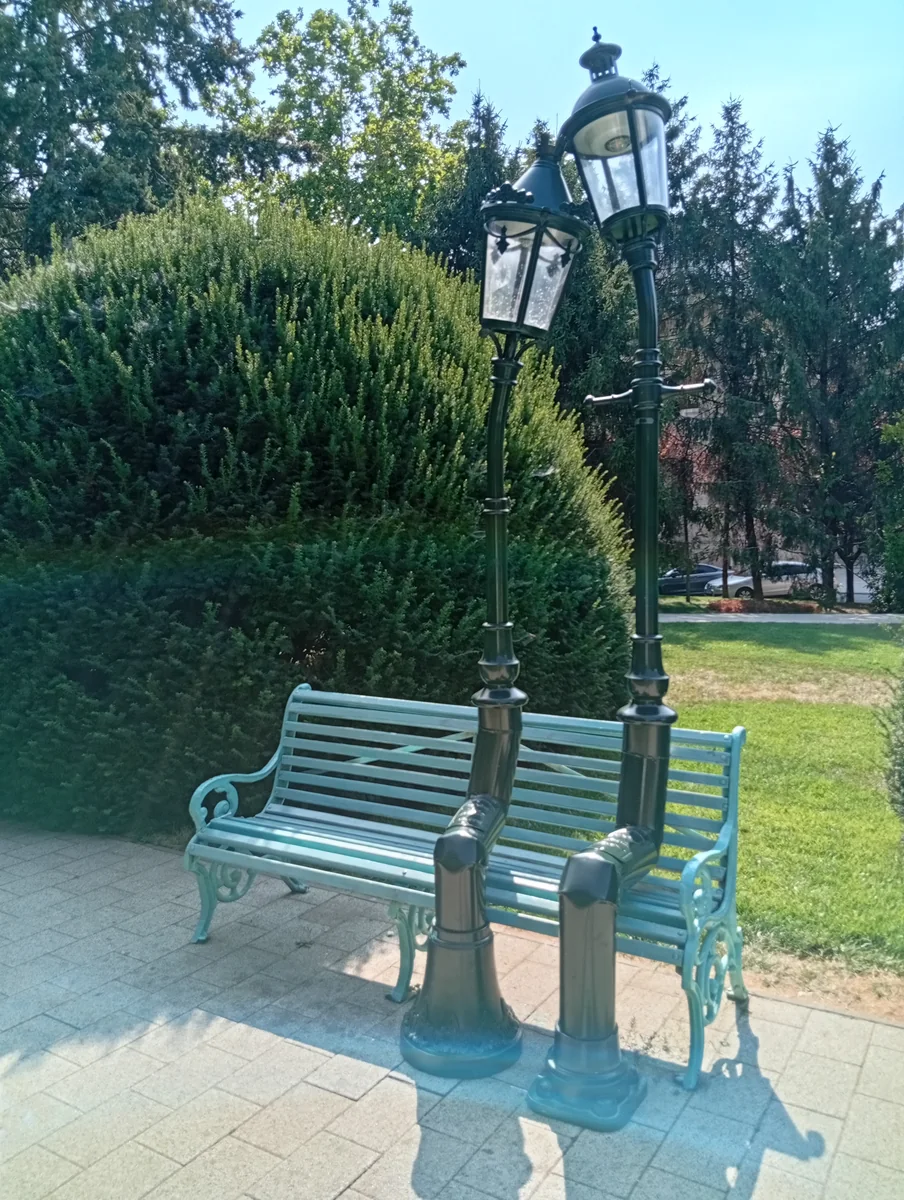 Cast-iron bench and lamp posts