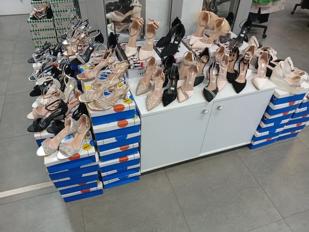 Heels displayed on their own boxes at another stand