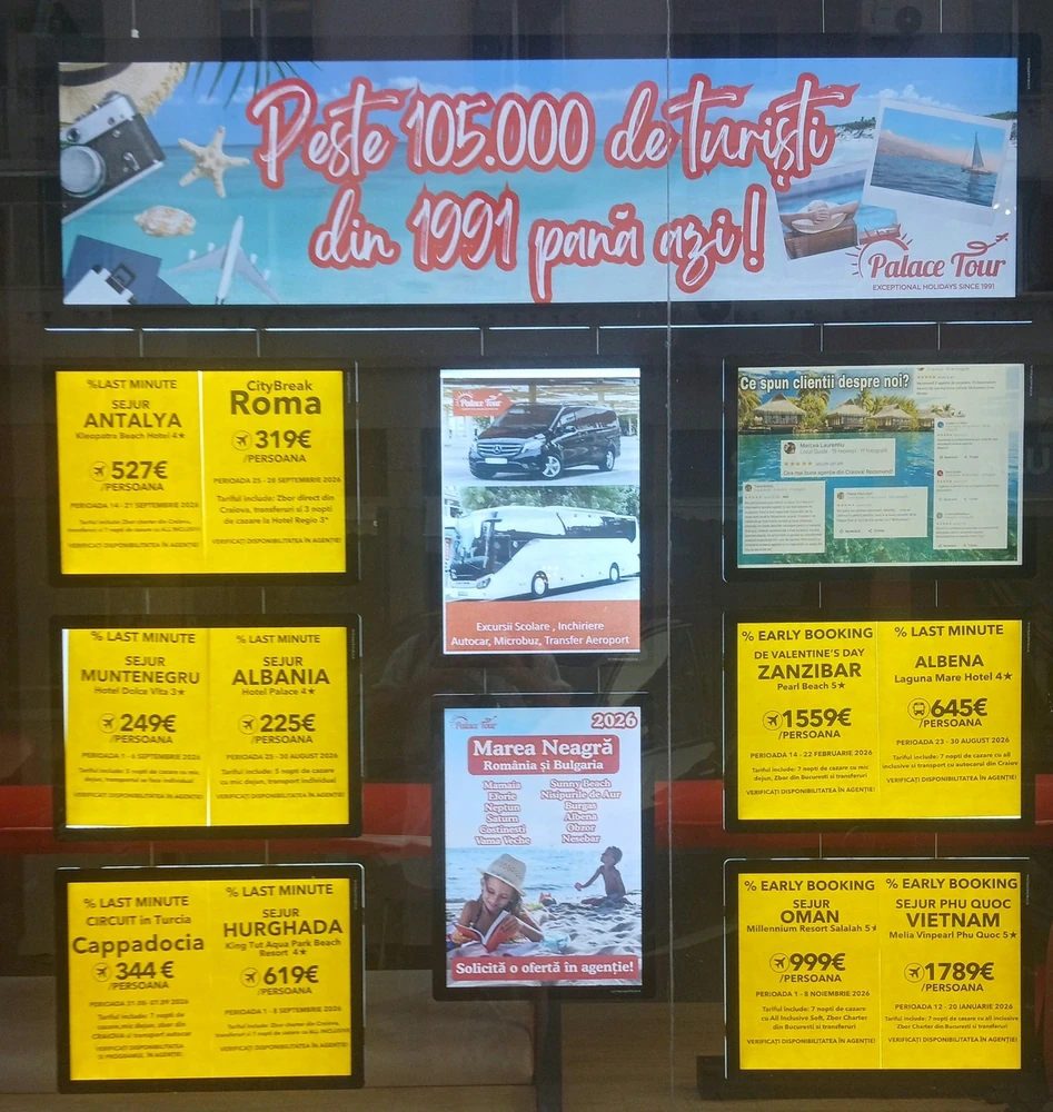 The second window of the same agency, with the coach fleet and the Black Sea programme in the middle