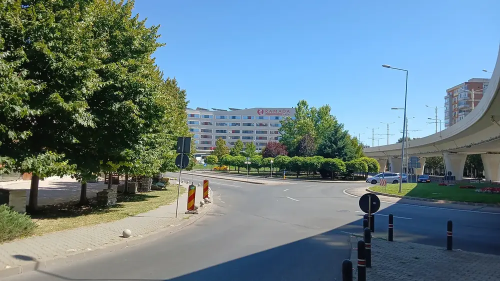 The same view a few steps further along: the flyover on the right is the landmark to aim for if you are walking in from Calea Bucureşti